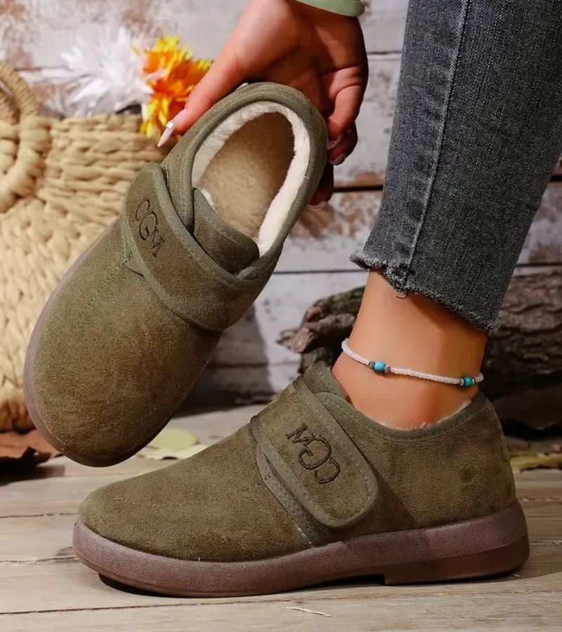 Doralise strap shoes in khaki, held in hand showing soft interior