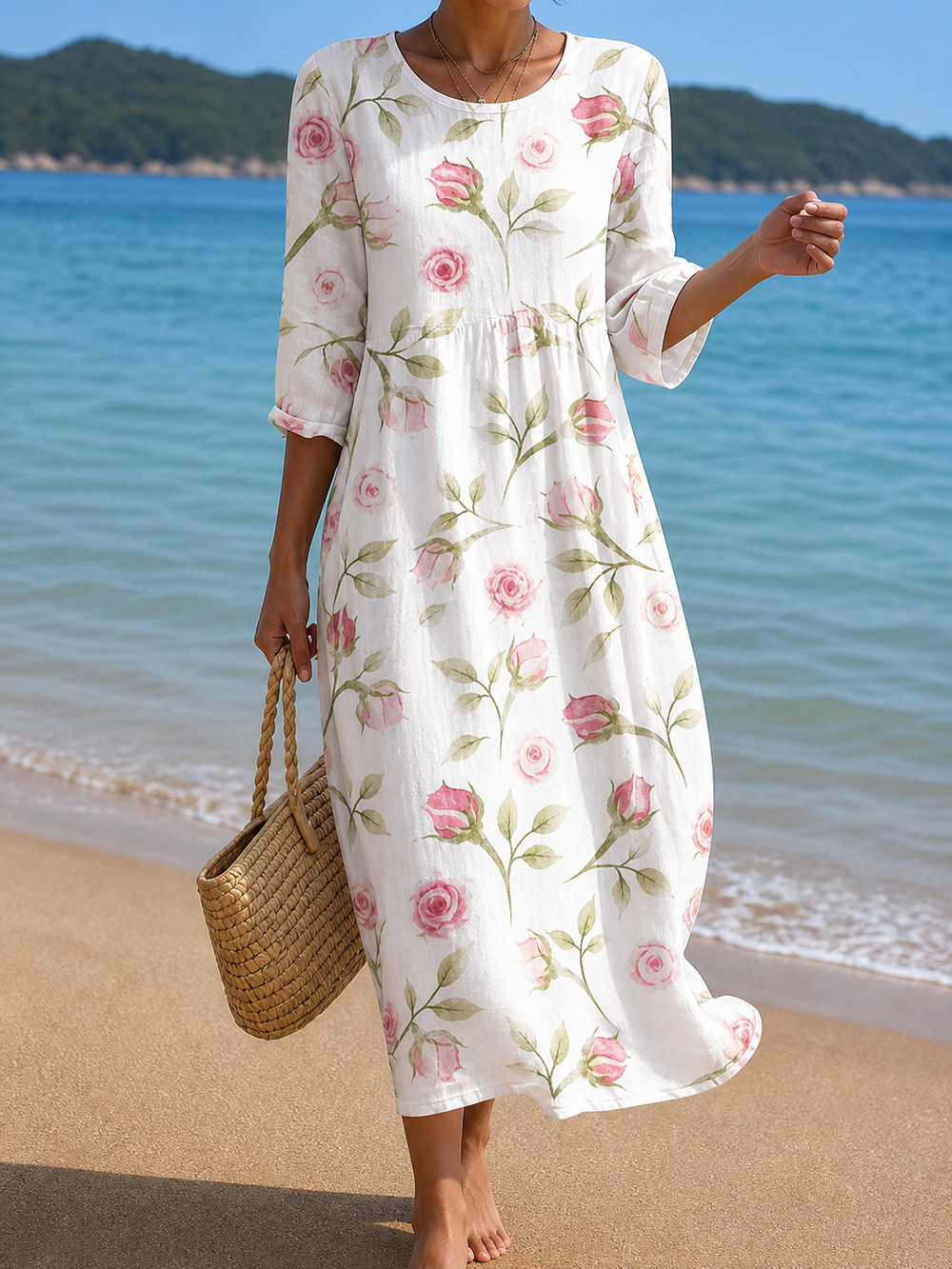 Casual floral print dress in white with pink roses, full-length front view on the beach