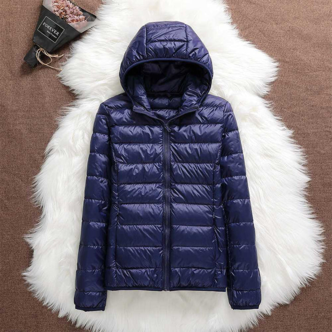 Metta padded jacket in navy blue, flat product view with hood and zip