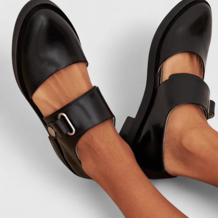 Isla black buckled shoes, angled close-up showing low heel and sole