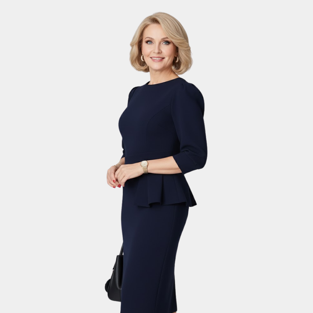 Claudine Bloom midi dress in navy, side view showing peplum ruffle