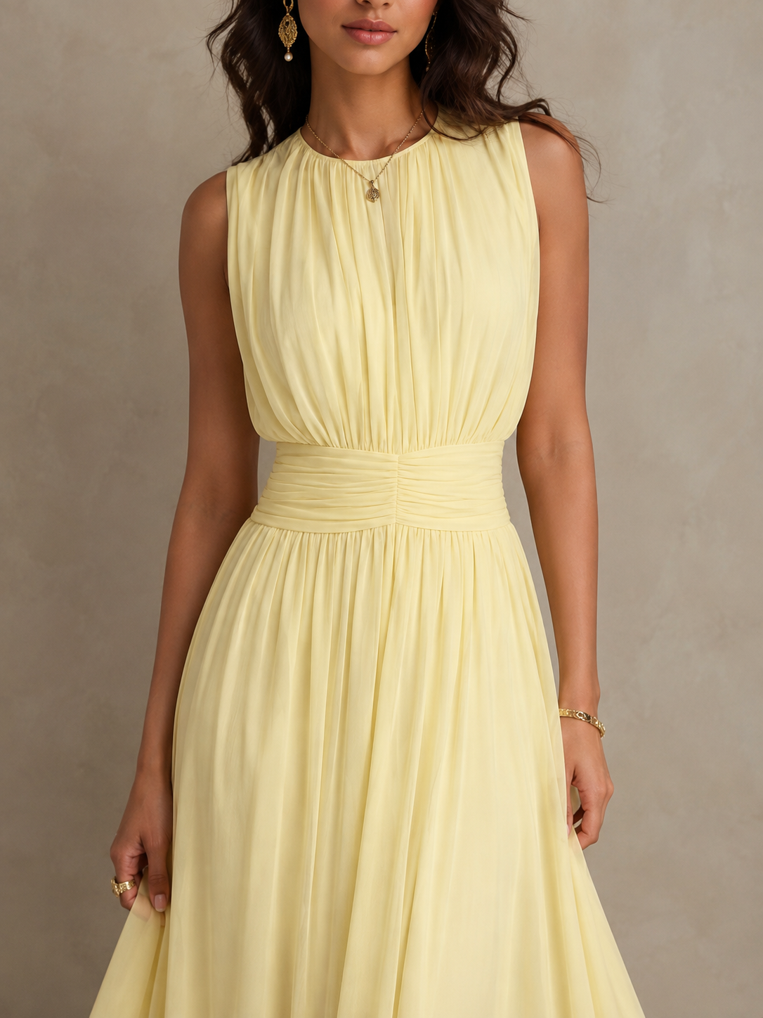 Chayna dress detail in yellow, close-up of ruched waistband and neckline