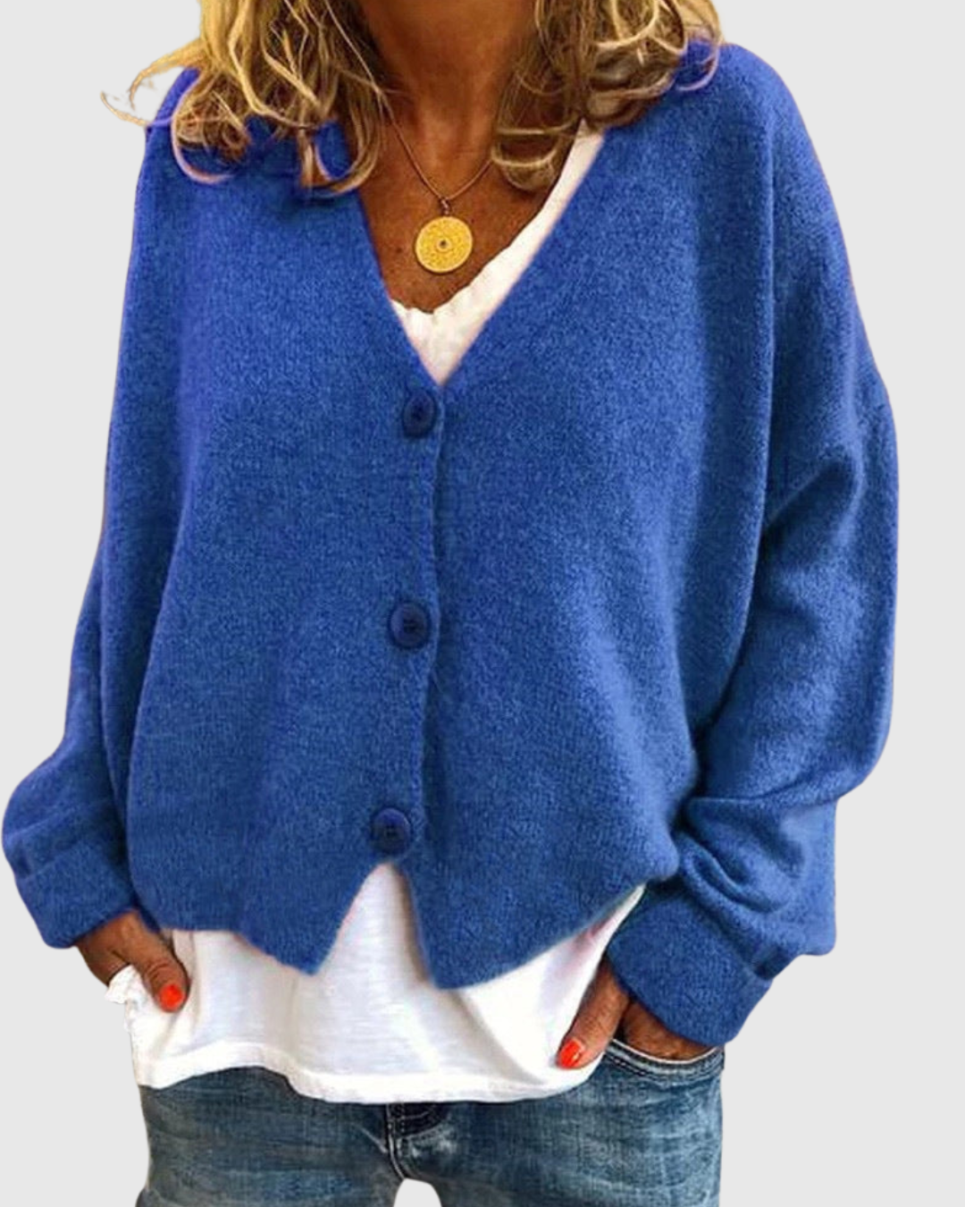 Evelora knit cardigan in blue, front view worn with jeans
