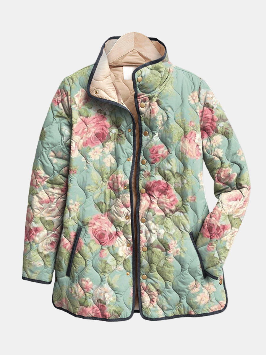 Carys retro floral padded jacket in sage green, front view with navy trim