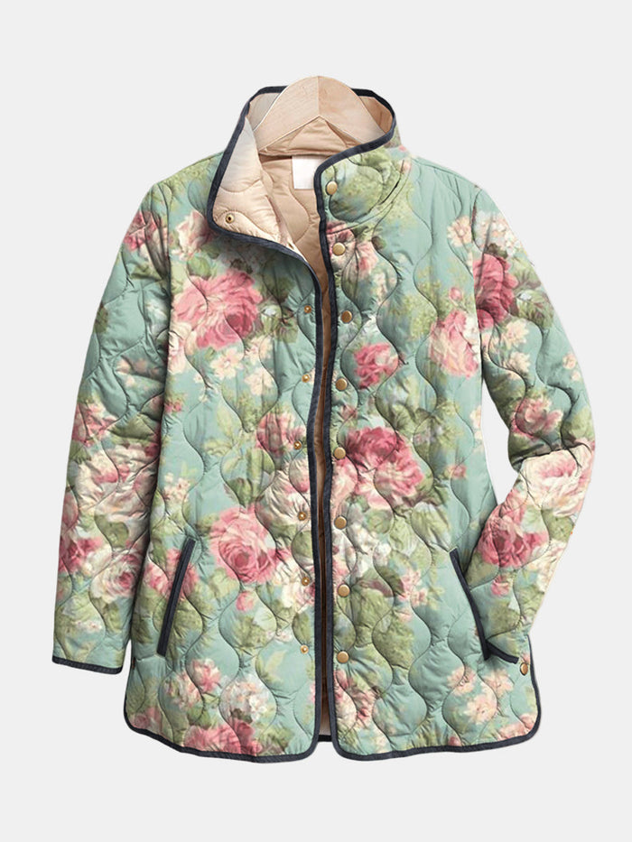 Carys retro floral padded jacket in sage green, front view with navy trim