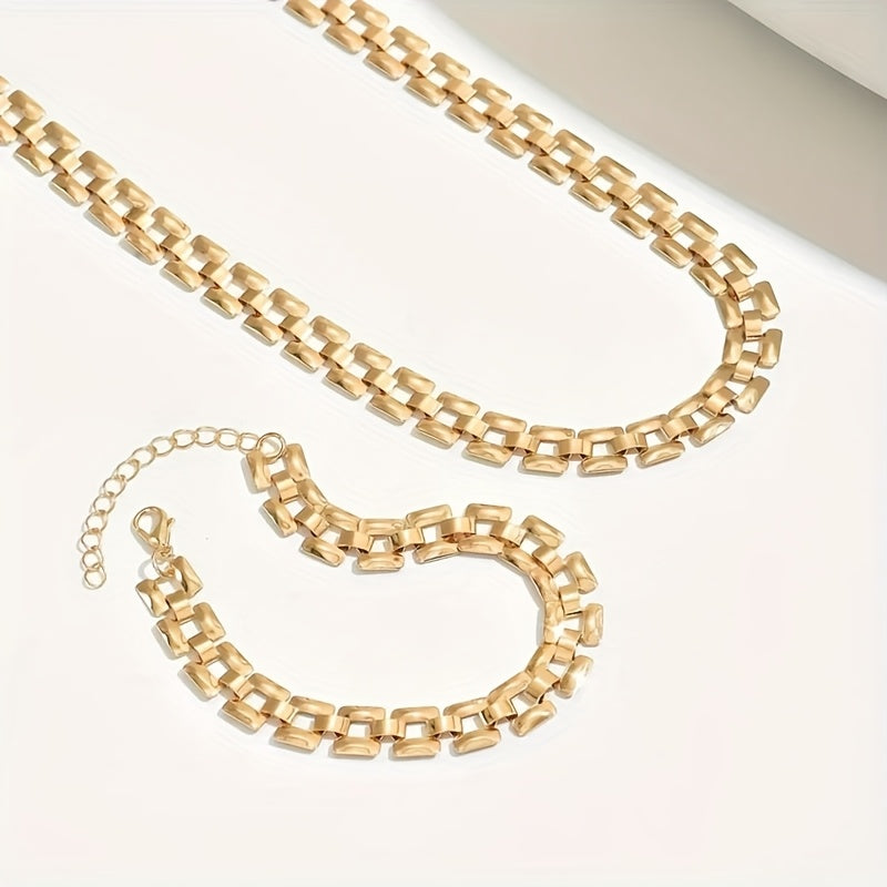 Close view of gold square link chain necklace and bracelet