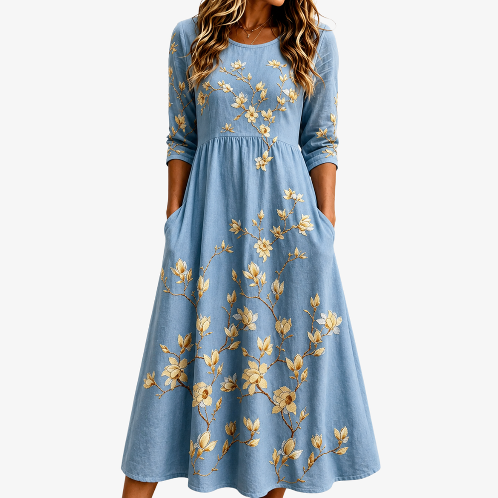 Bluebell meadow pocket midi dress in soft blue with golden floral branches, front view