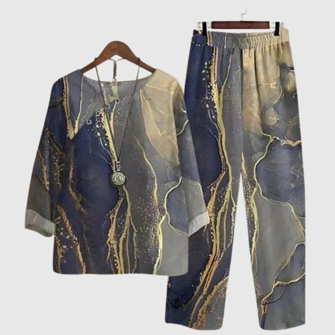 Clarisse two-piece set in blue and gold marble print, front view