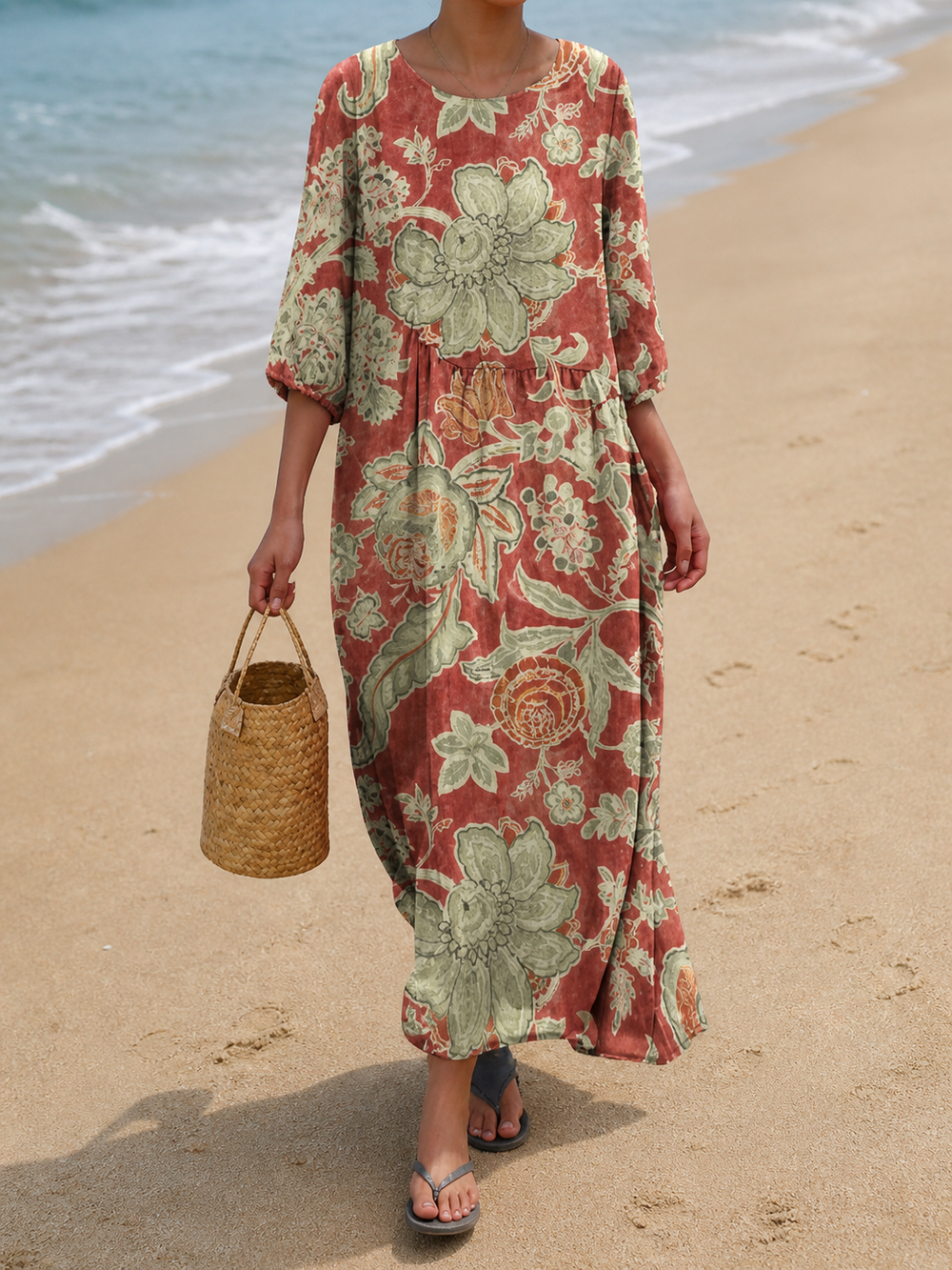 Casual floral print maxi dress in terracotta and sage, front view on the beach