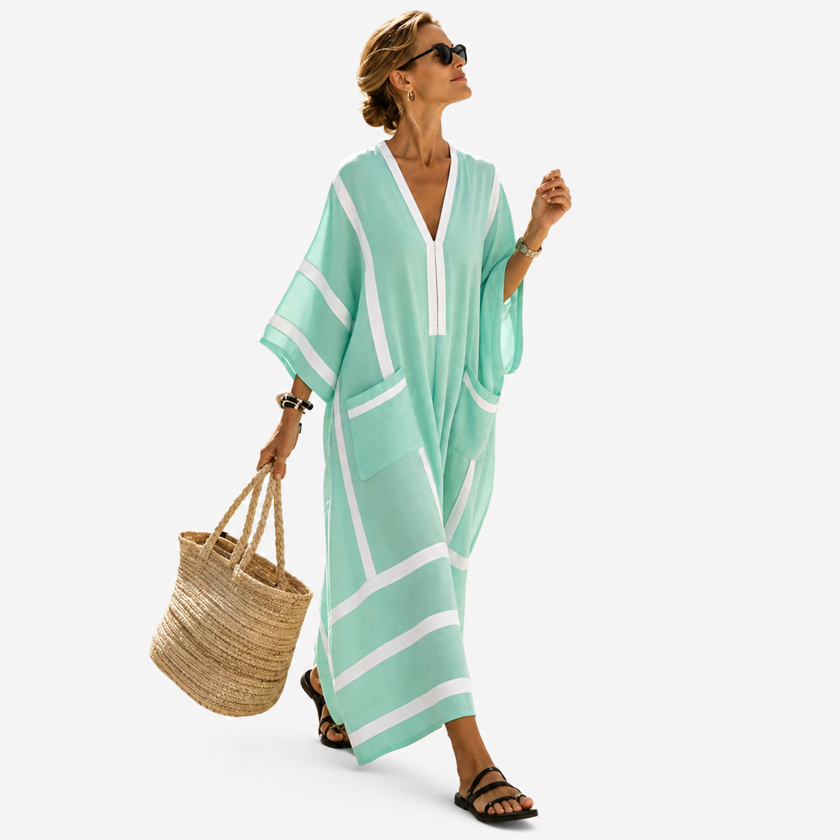 Long kaftan in mint green with white colourblock stripes, full-length front view