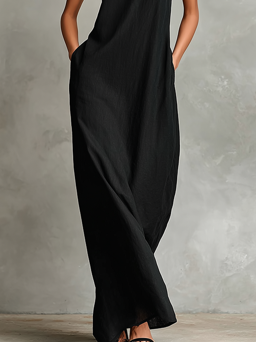 Chrissy maxi dress in black, detail of side pockets and flowing skirt