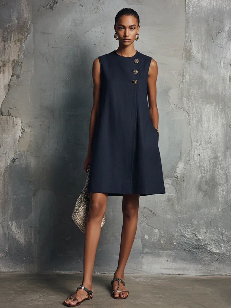 Aubrey asymmetric button mini dress in navy, full-length front view