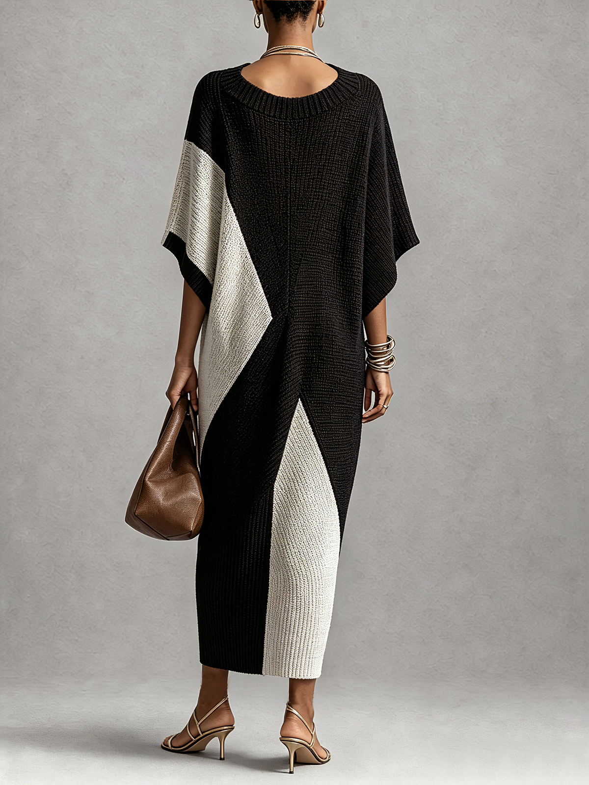 Véra midi dress in black and ivory, back view with ribbed neckline