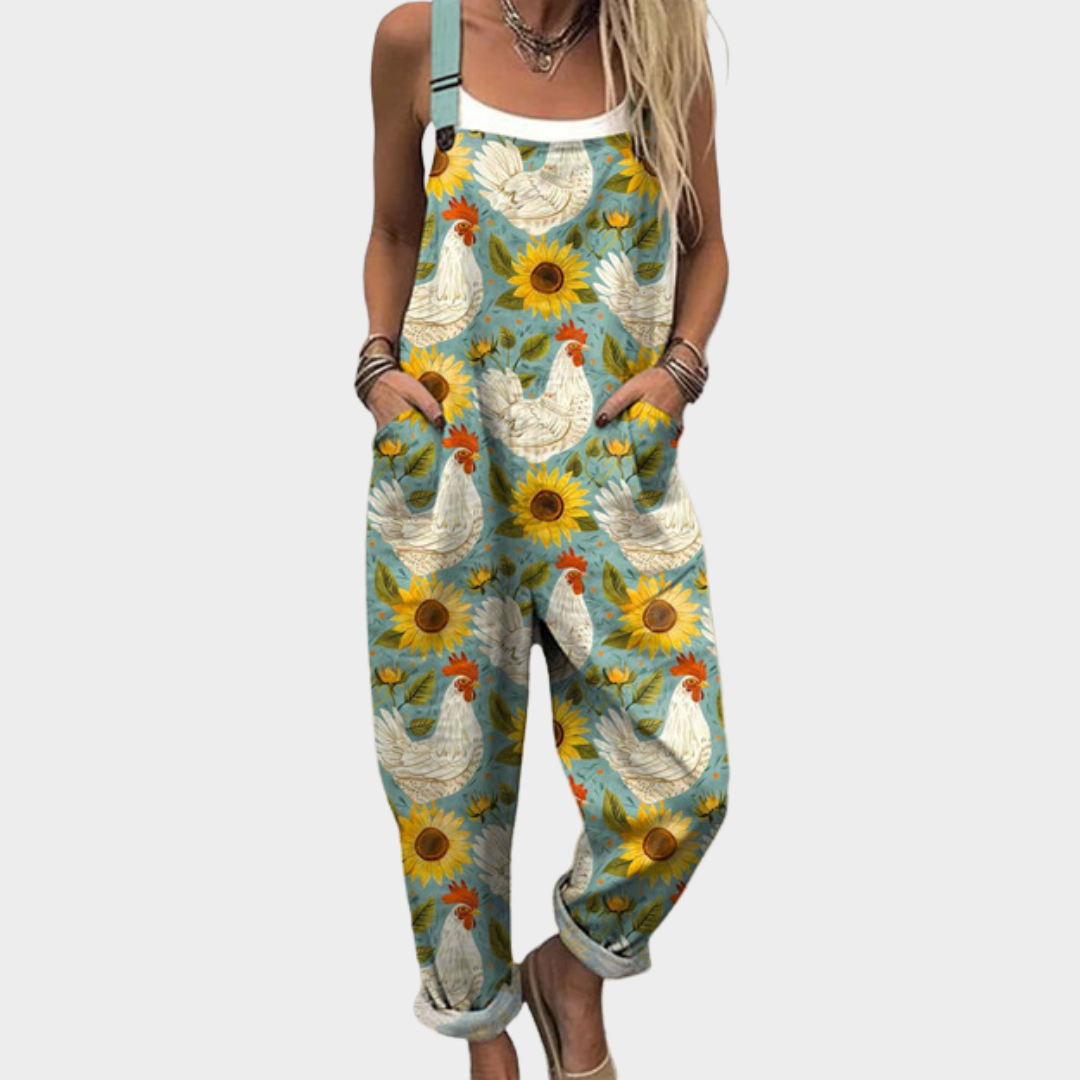 Printed dungarees in teal with sunflower and hen print, full-length front view