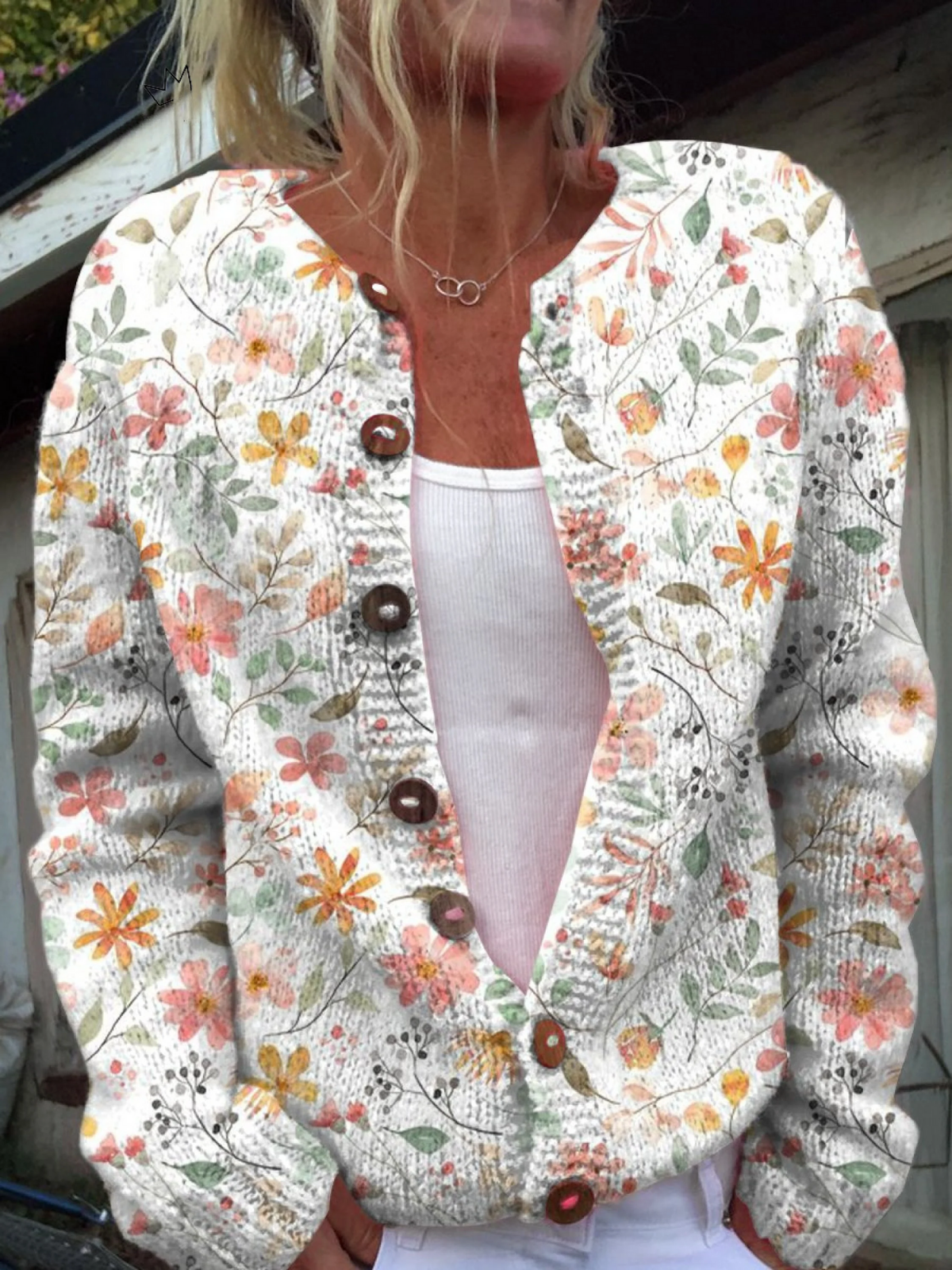 Greta vintage floral knit cardigan in cream with wood-tone buttons, front view