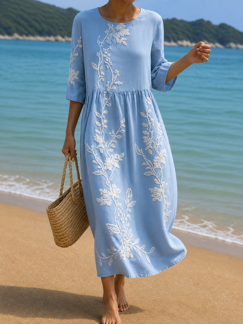 Long floral print dress in light blue with white embroidered blooms, full-length front view