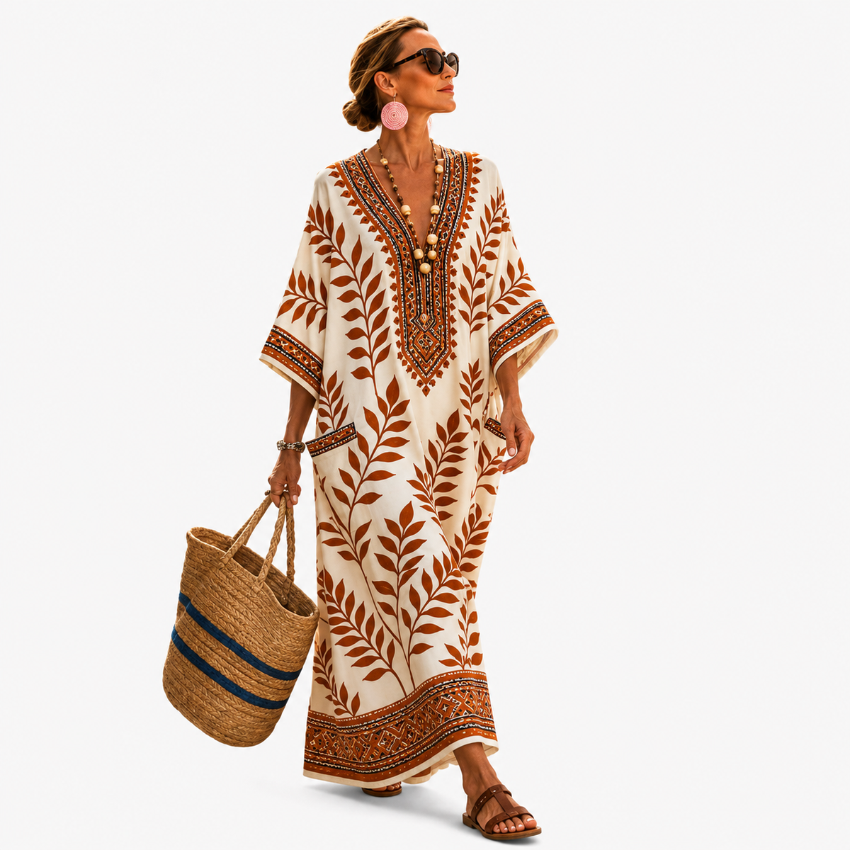 Long kaftan in cream with brown leaf print, full-length front view with deep V-neck