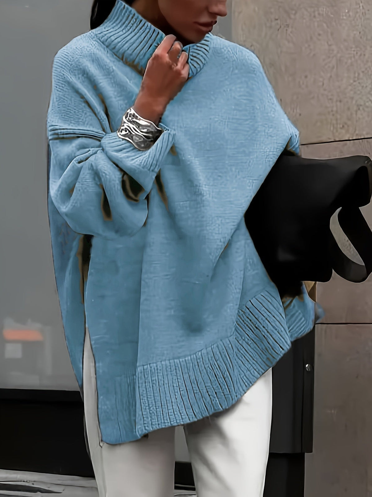 Claar oversized turtleneck sweater in cyan, front view