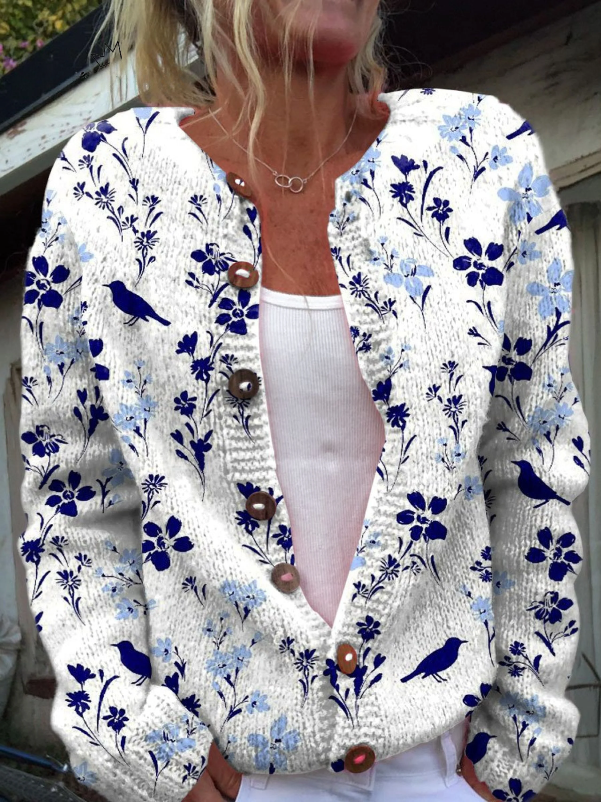Vynora floral bird print cardigan in cream and navy, front view worn open over a white top