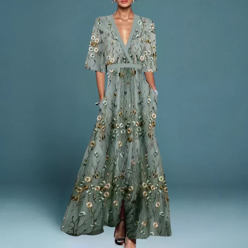 Sophia floral evening dress in green, full-length view with side pockets