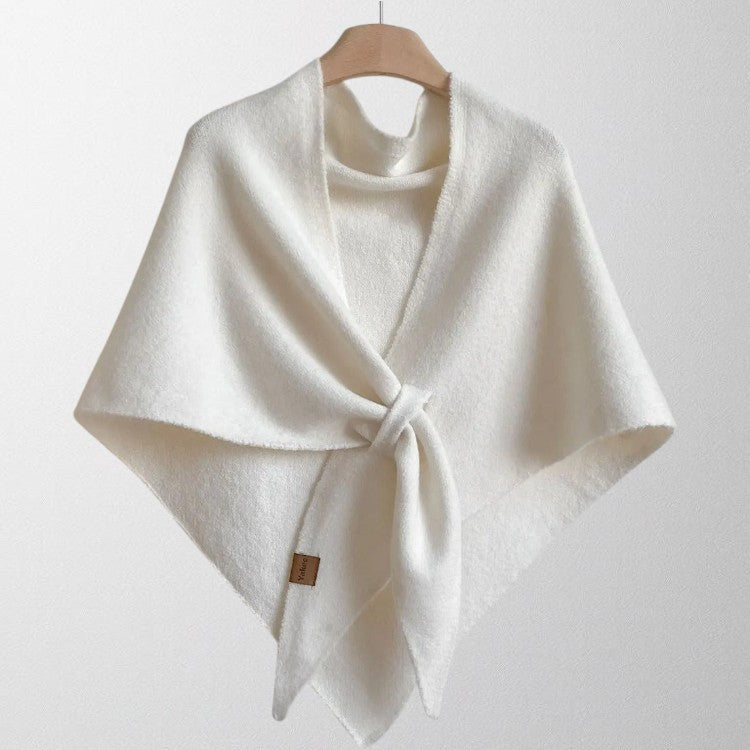 Averil knit shoulder scarf in white, front-tie view on a hanger