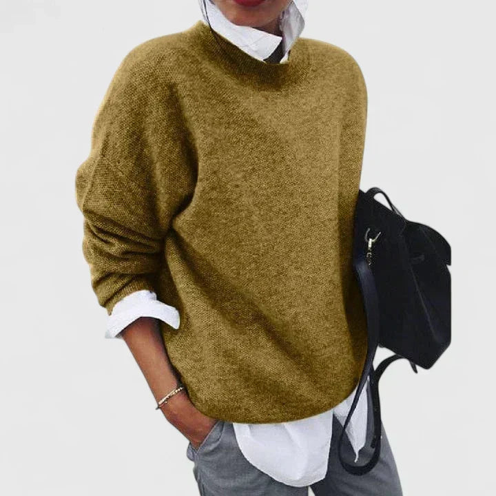 Lorna sophisticated sweater in khaki, layered over a white shirt