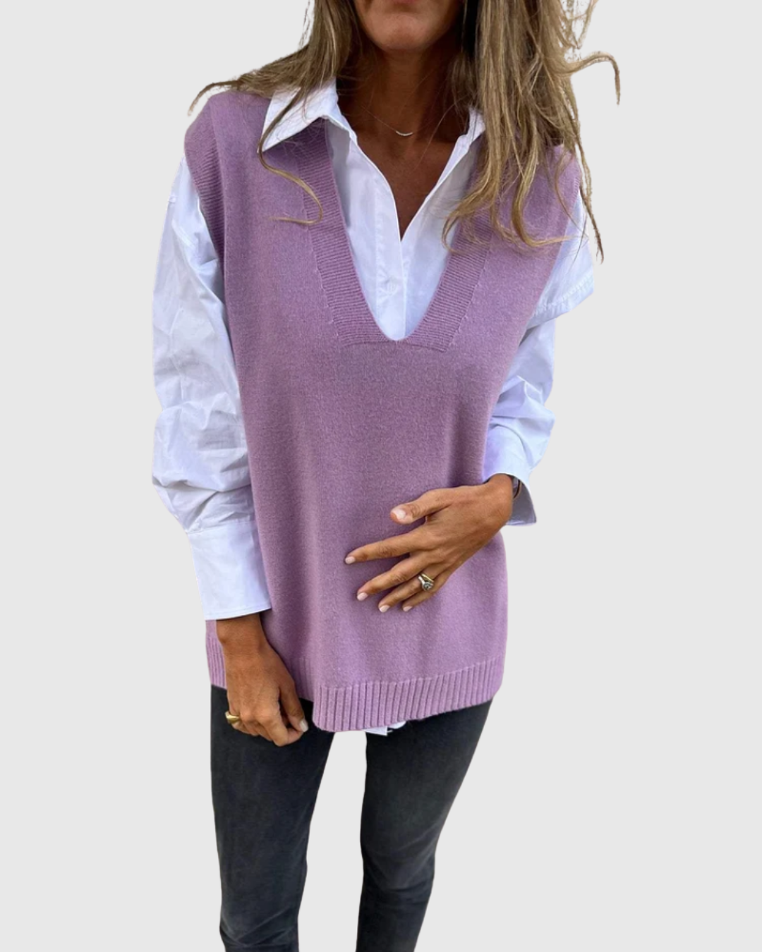 Nerelis knit sweater vest in purple, styled with a white shirt, front view