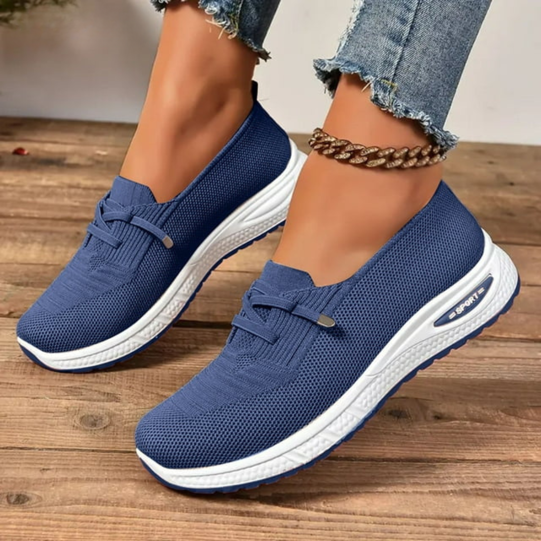 Raquel orthopedic comfort shoes in blue, front view worn with jeans