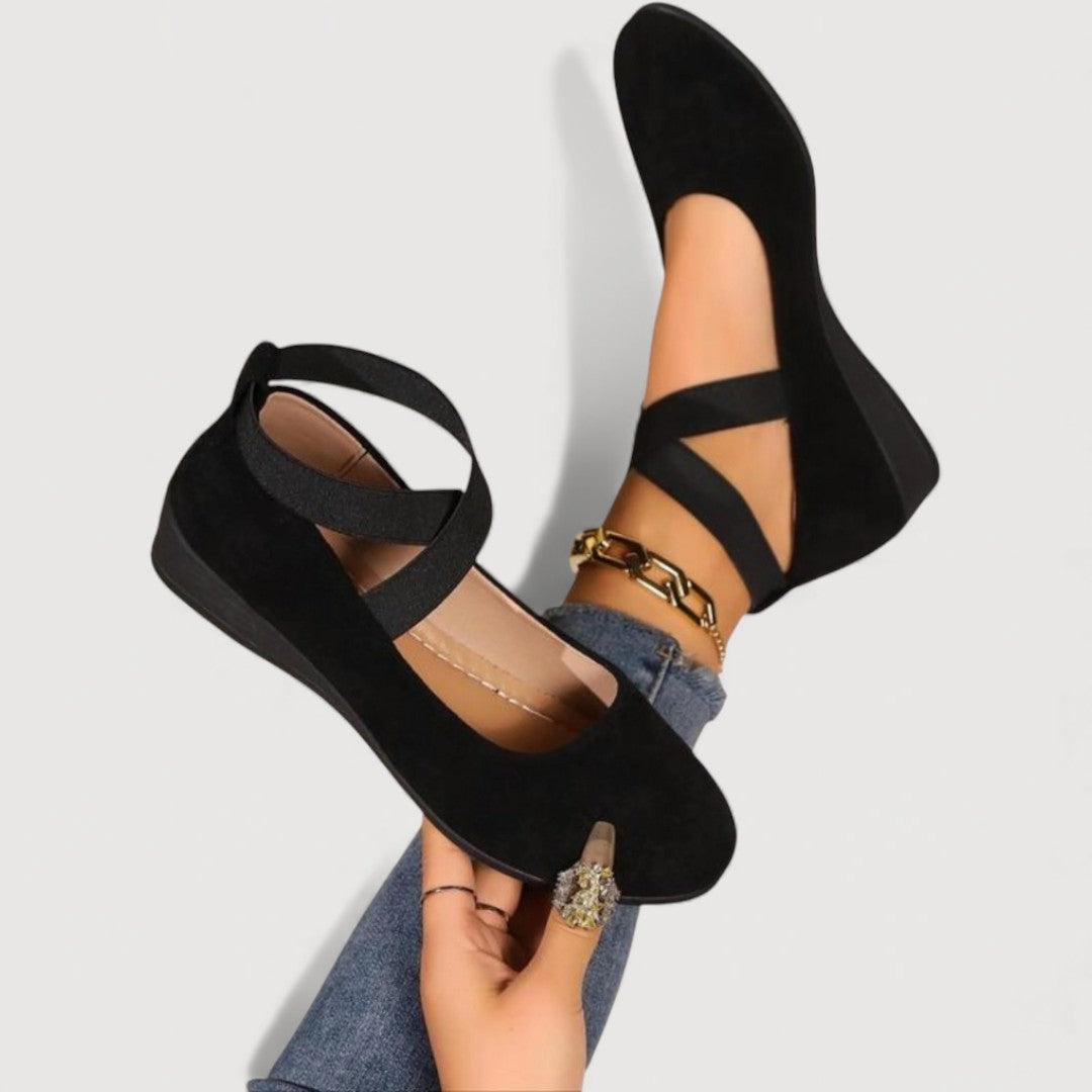 Vivienne flat ballet pumps in black, close-up of crossed straps