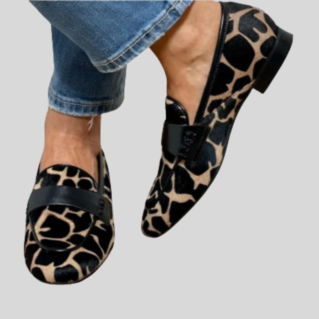 Katherine classic loafers in black and beige animal print, worn with cropped jeans