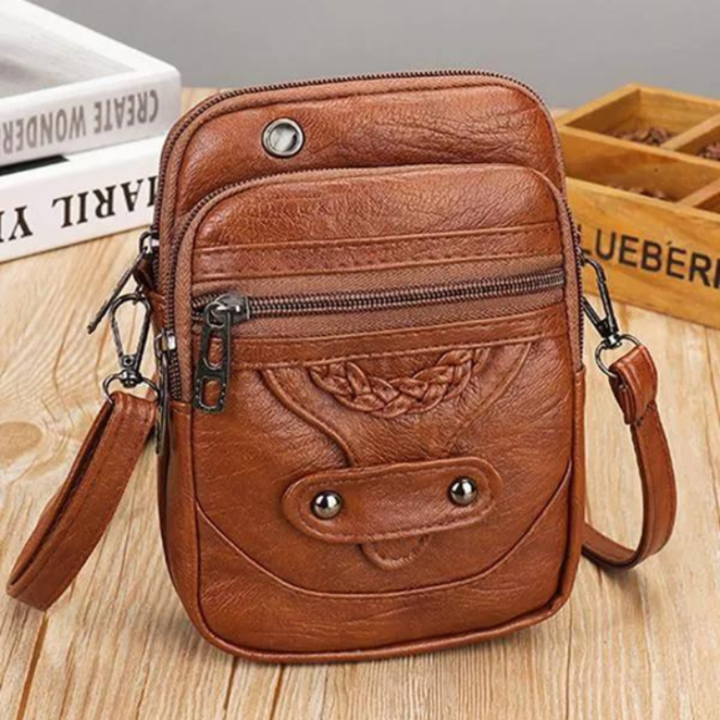 Irena vintage crossbody bag in brown, front view with braided detail