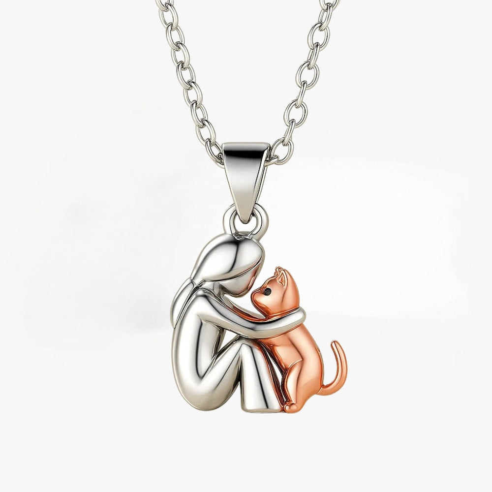 Islara cat-shaped necklace in silver and rose gold, pendant close-up