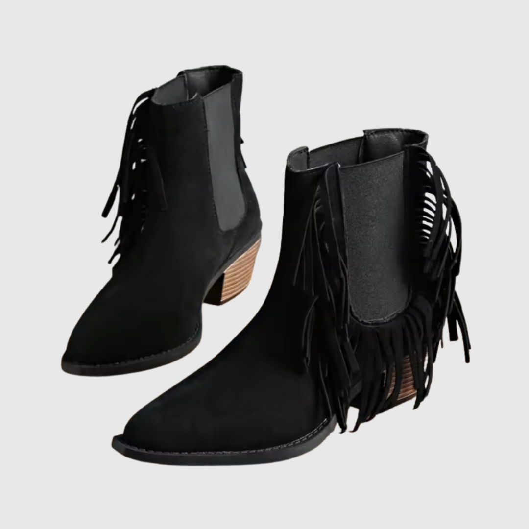 Olivine fringe ankle boots in black, pair on plain background