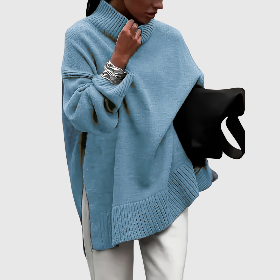 Victoria's oversized sweater in peacock blue, front view on model
