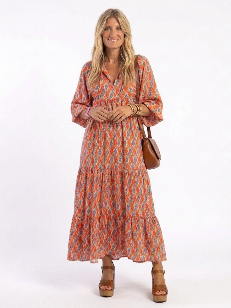Amara geometric print midi dress in coral, full-length front view