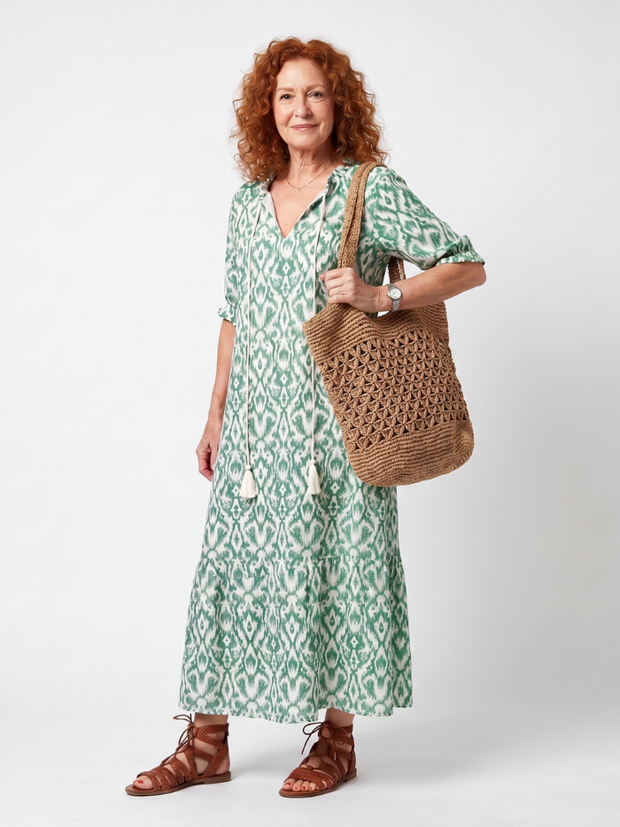 Ilara patterned tassel midi dress in green, full-length front view