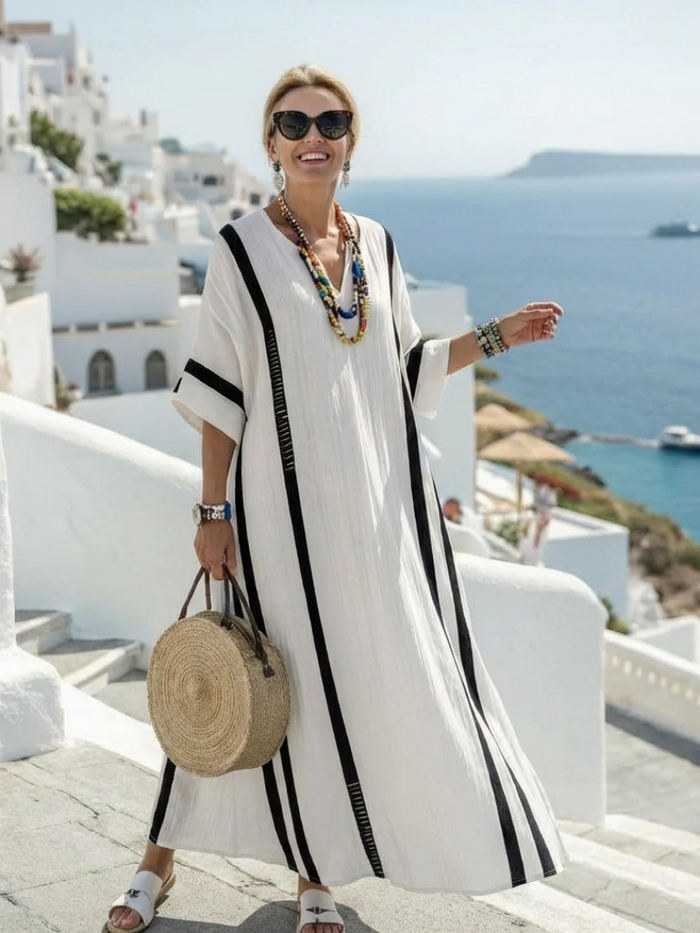 Elvienne striped maxi dress in white, full-length front view