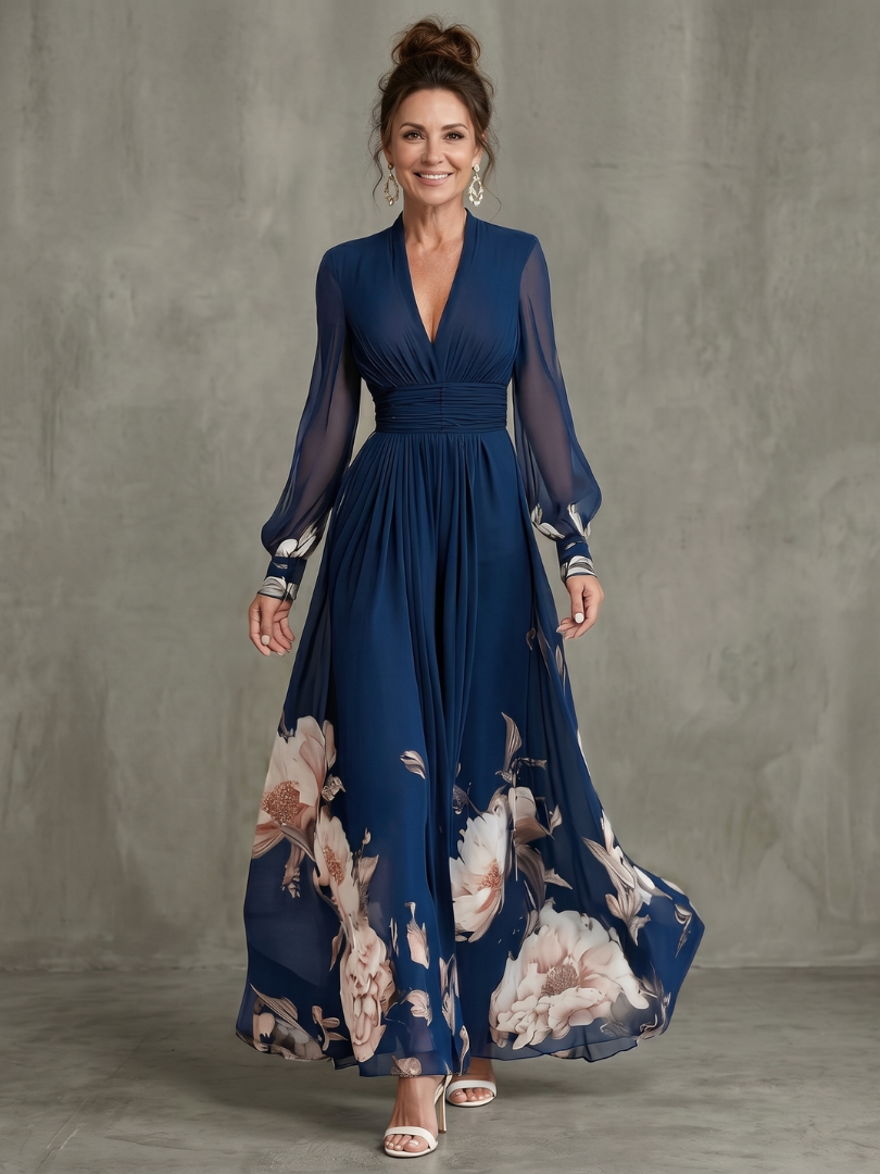 Ziva pleated maxi dress in navy with floral hem, full-length front view