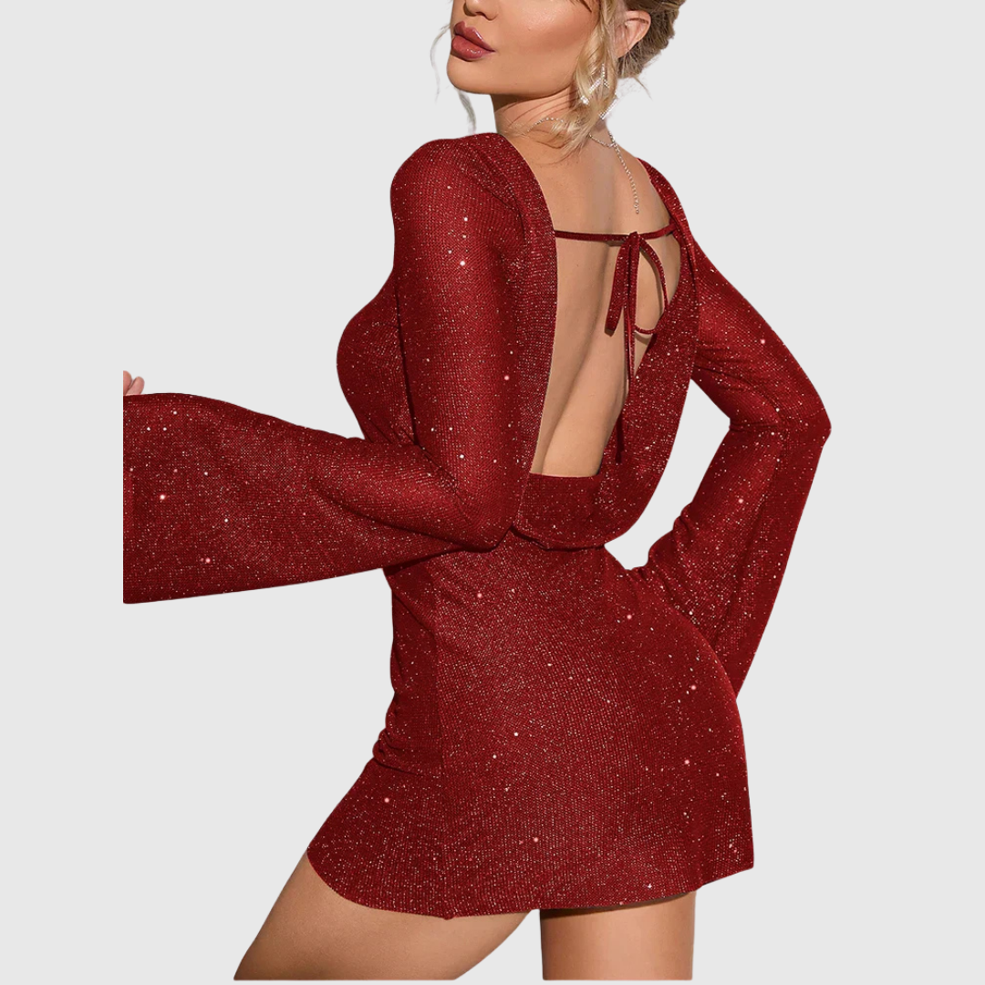 Isadora shimmering mini dress in red, side view showing open back