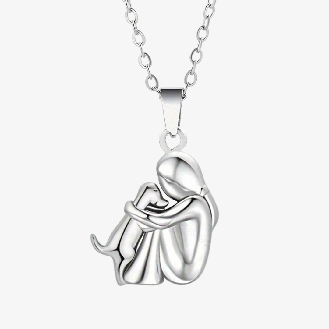 Marinette dog pendant necklace in all silver, front view