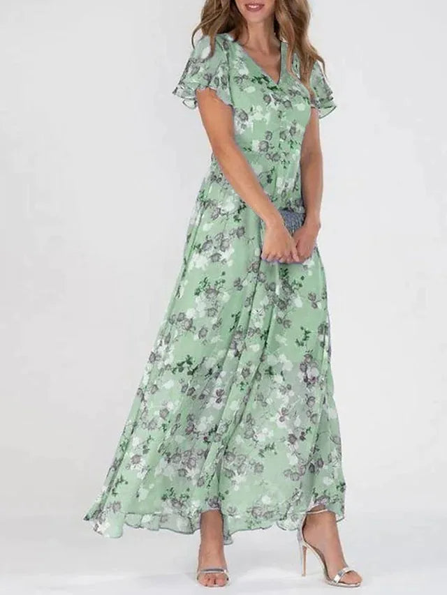 Judith floral dress in green, studio front view