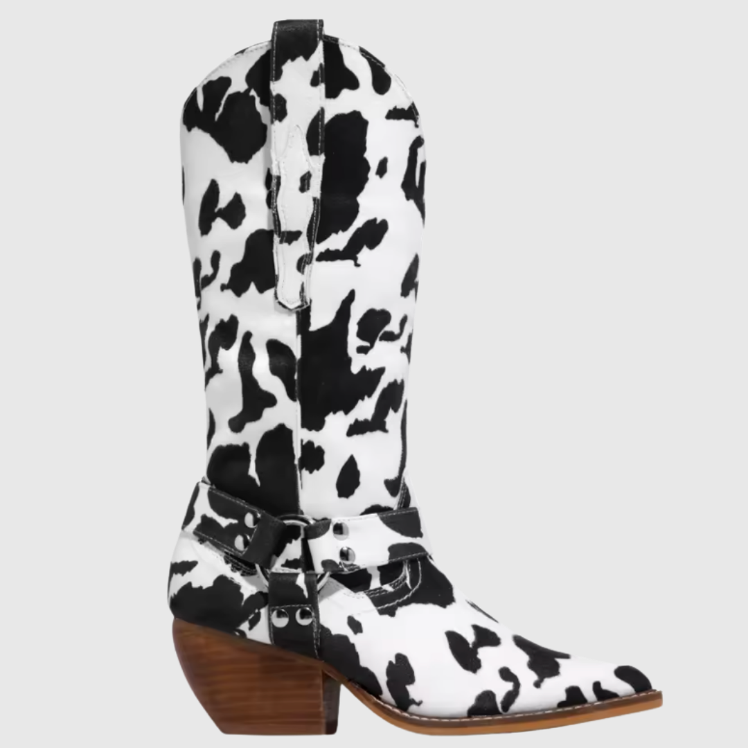 Fiorenne cowboy boot in black and white cow print, side view