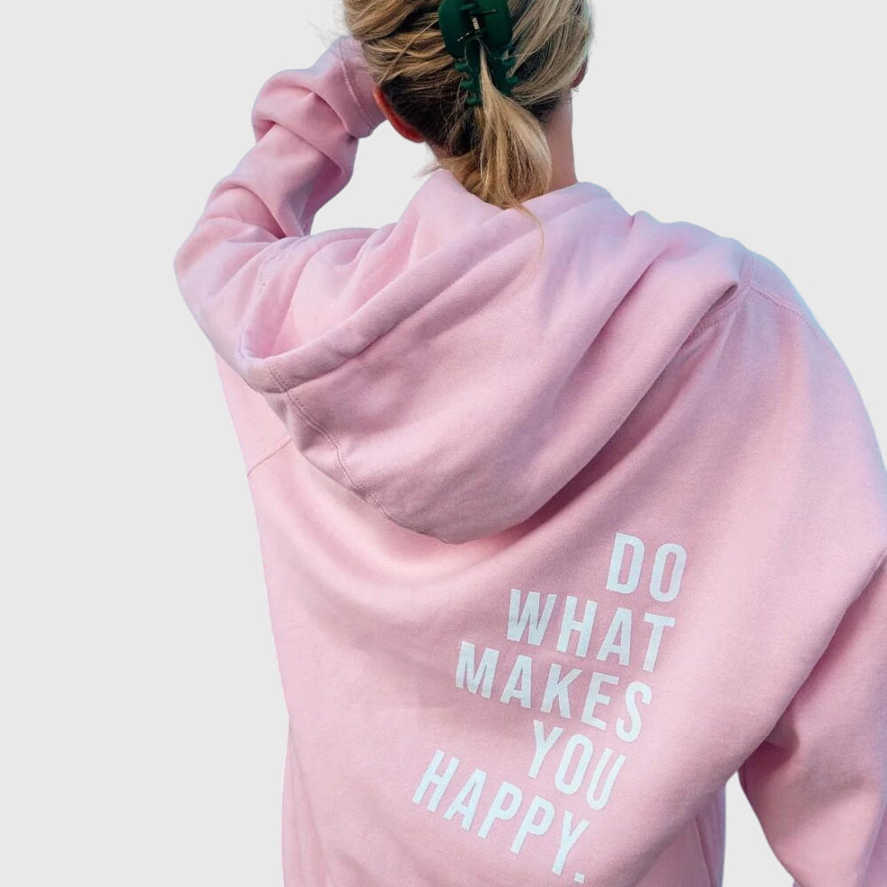 Lucy oversized hoodie in light pink with white back print, close-up rear view