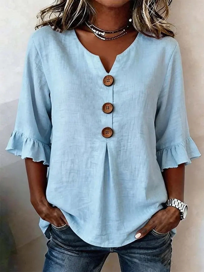 Jessara ruffle-sleeve blouse in light blue, front view with flounced cuffs