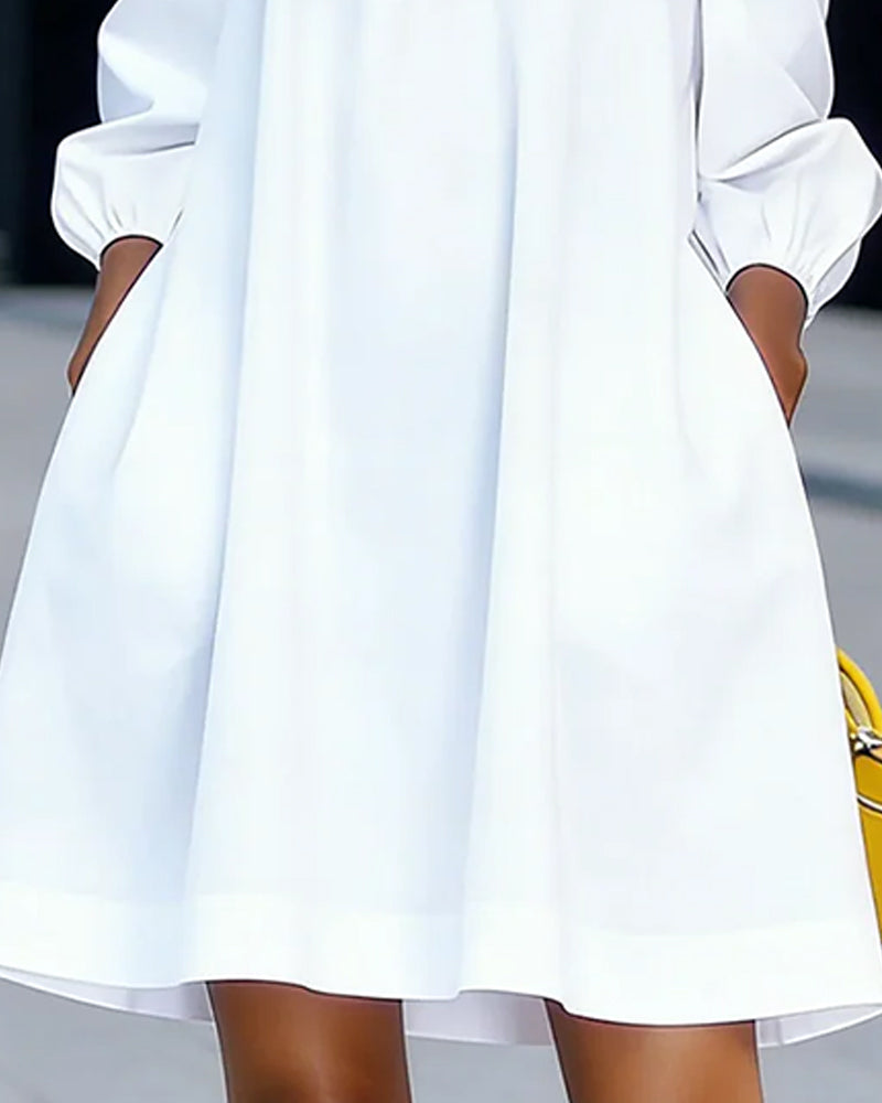 Rowena white A-line dress, close-up of skirt and side pockets