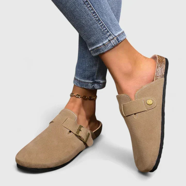 Katrien mocha loafers worn, showing buckle strap and press stud