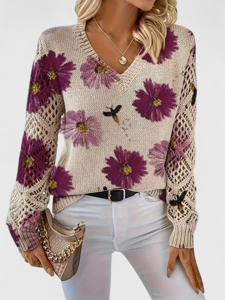 Tahlia floral sweater in cream with purple blooms, styled with white jeans