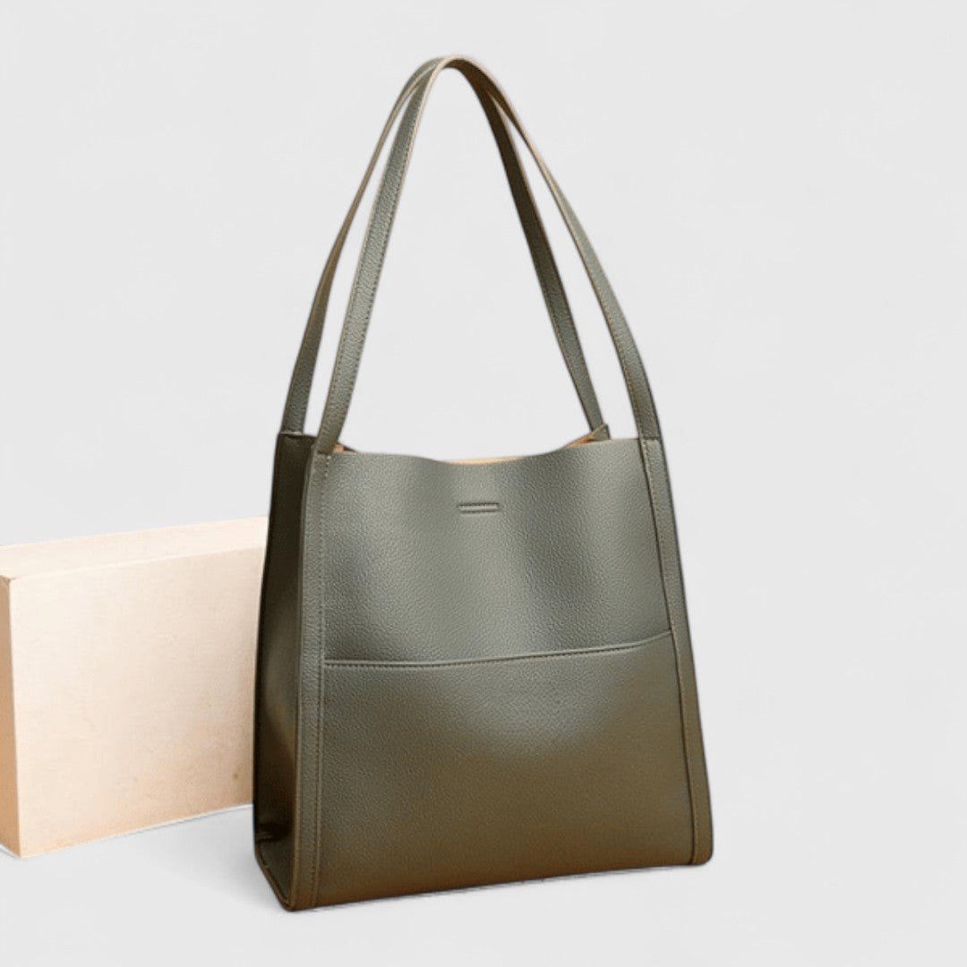 Elegant shoulder tote in green, standing front view