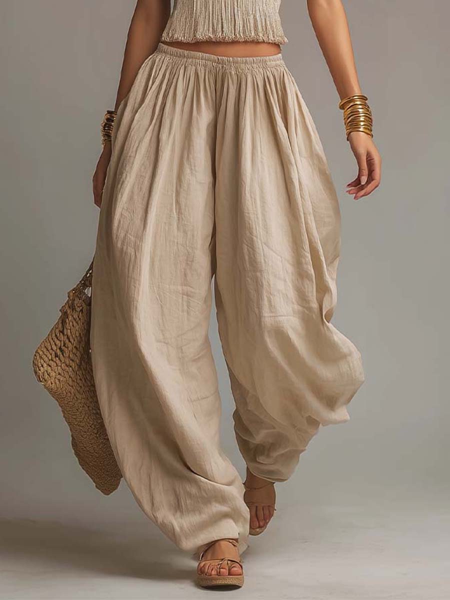 Close-up of Danna harem trousers with gathered elastic waist in beige