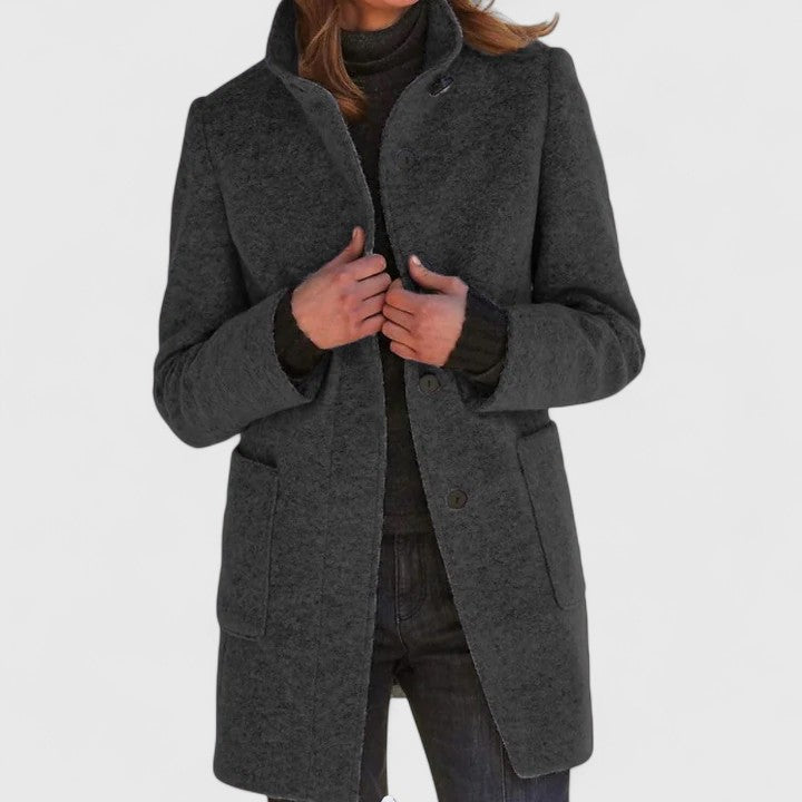 Harriette elegant coat in dark grey, front view worn with jeans